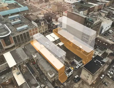 Aerial photo of downtown London with translucent orange timber additions modelled above existing buildings