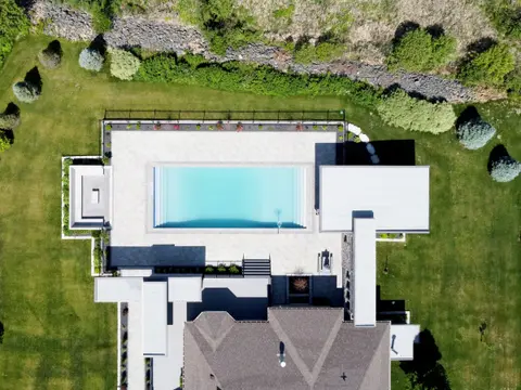 Overhead view of the pool, patios and canopies
