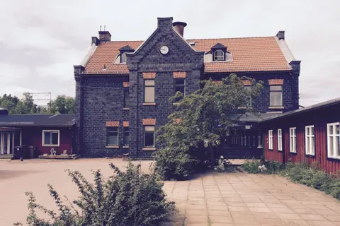 An eighteenth-century building of dark slag blocks in Falun, Sweden